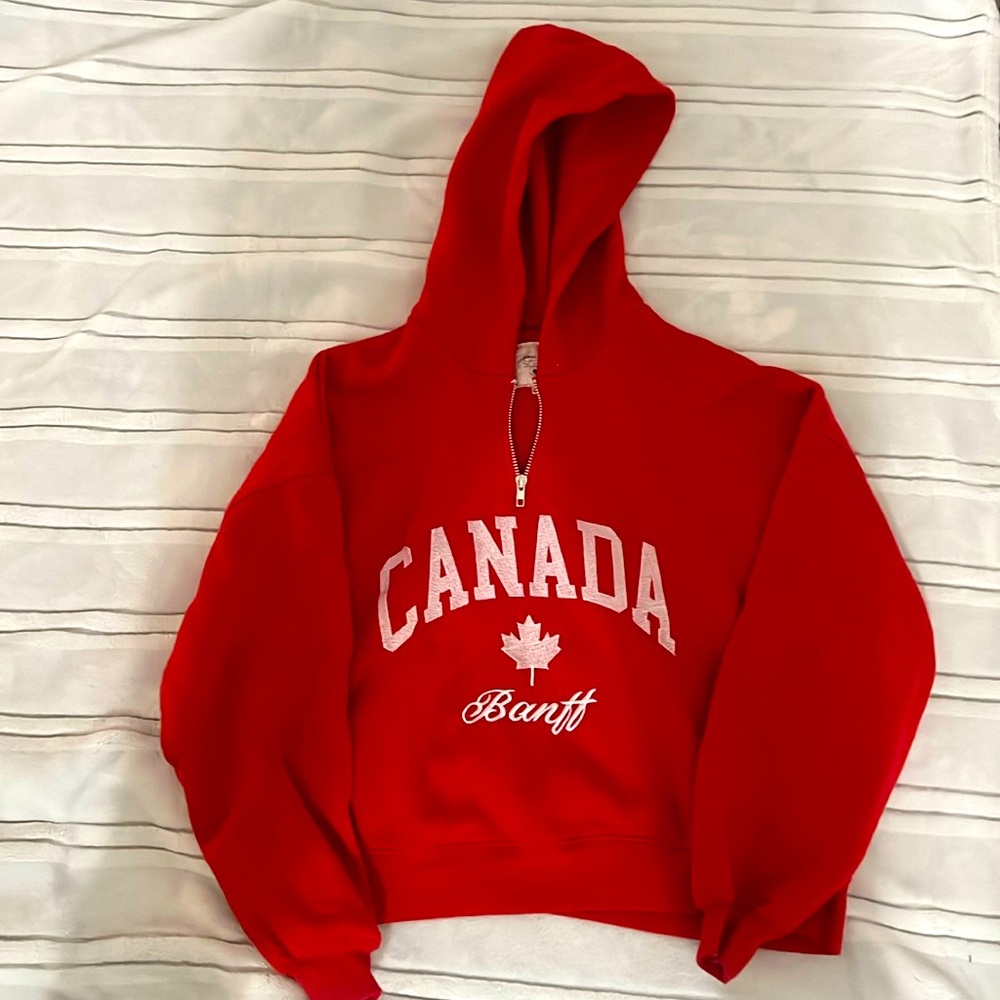 Red Canada sweatshirt gently used.